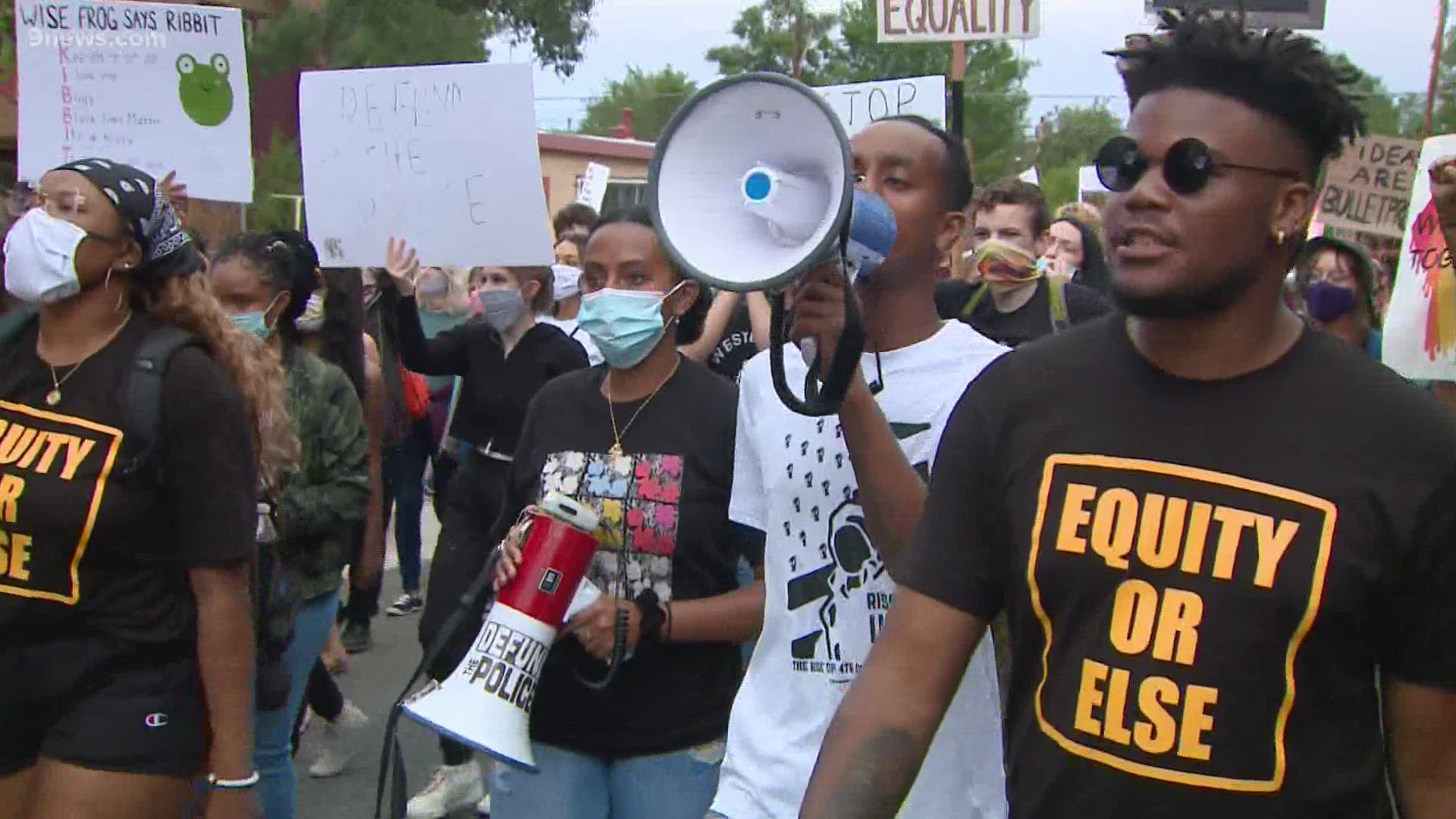 The march went through Denver neighborhoods before ending at Manual High School.
