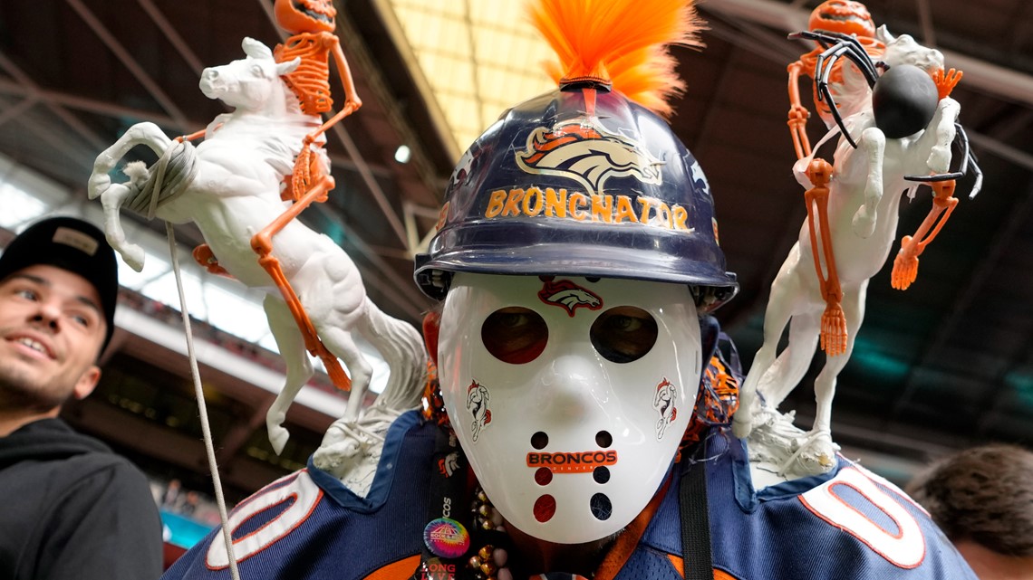 Denver Broncos orange-blue stripe uniform combo returns vs Titans