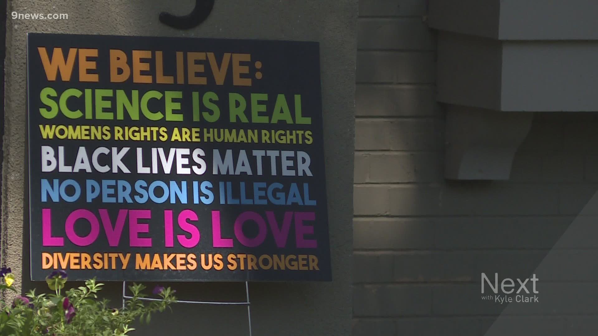 Colorado law states community associations can’t ban political signs around elections, but they can make rules about all other signs. That's caused debate in Lowry.