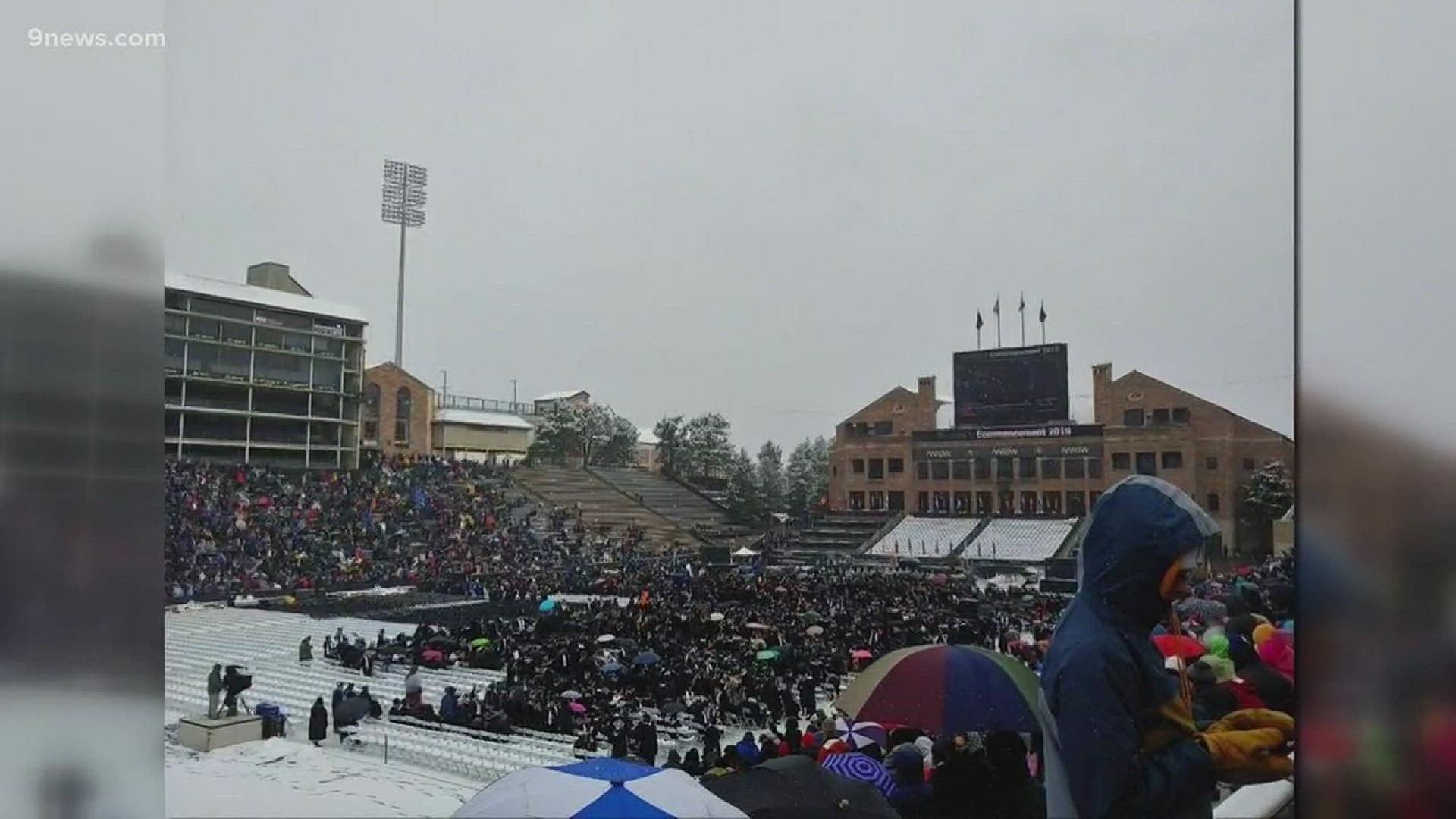 The spring commencement ceremony took place Thursday morning outdoors despite, snowy weather.