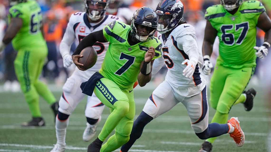 Broncos Russell Wilson greets some Seahawks, 1st fans in boo