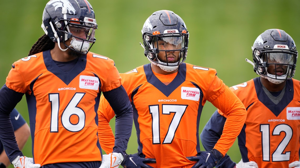 Russell Wilson sets tone in Broncos' OTAs with 'wild obsession' with winning