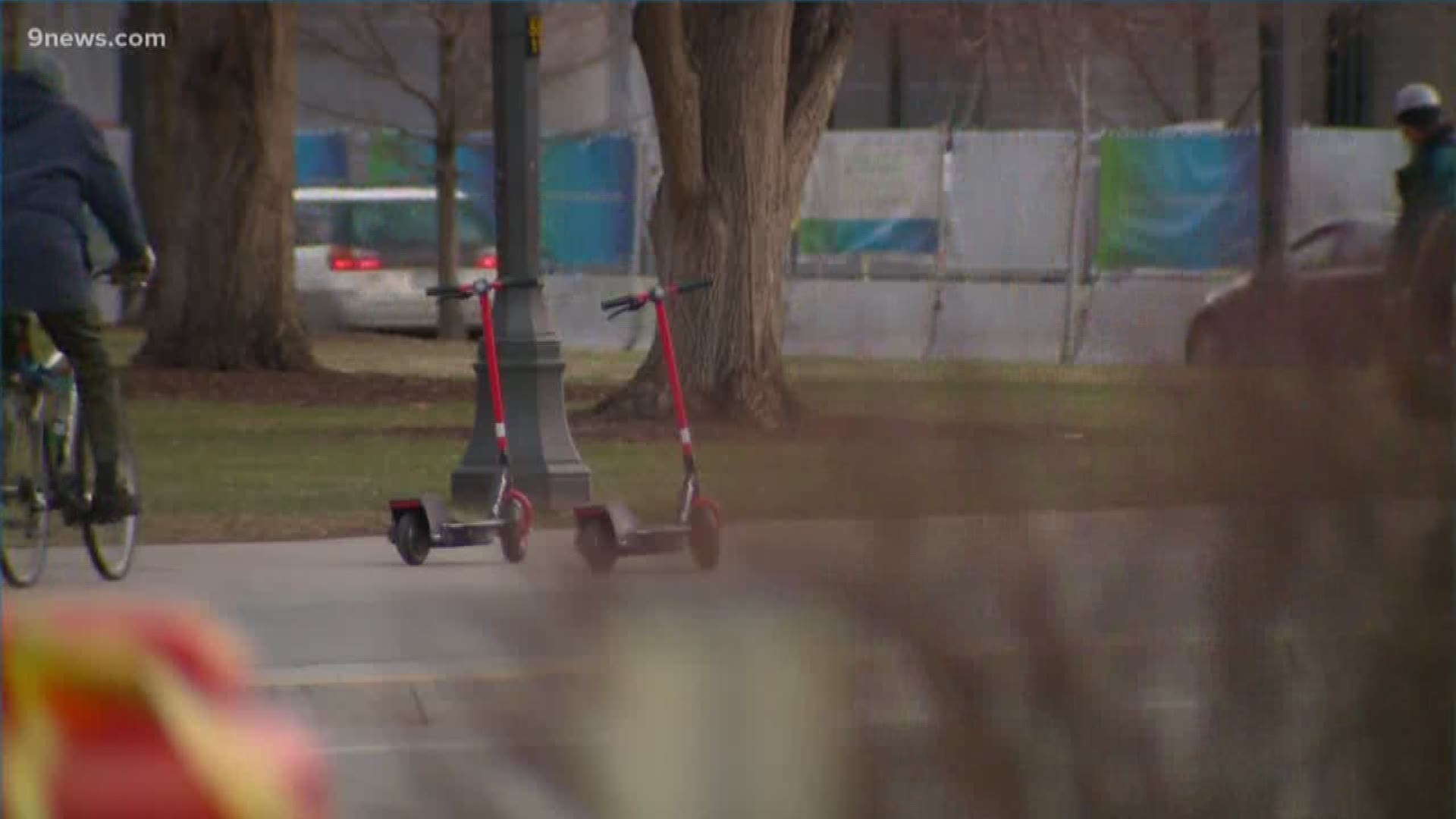 Electric scooters banned from Denver sidewalks, city council votes