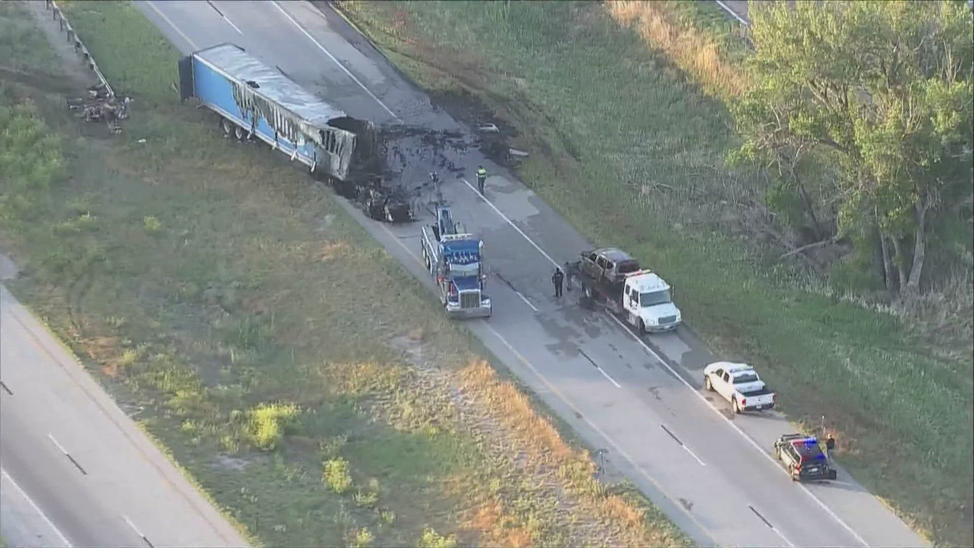 Colorado State Patrol said all eight people were in an SUV when it was hit head-on by a semi truck that crossed the median on Interstate 70 near Byers.