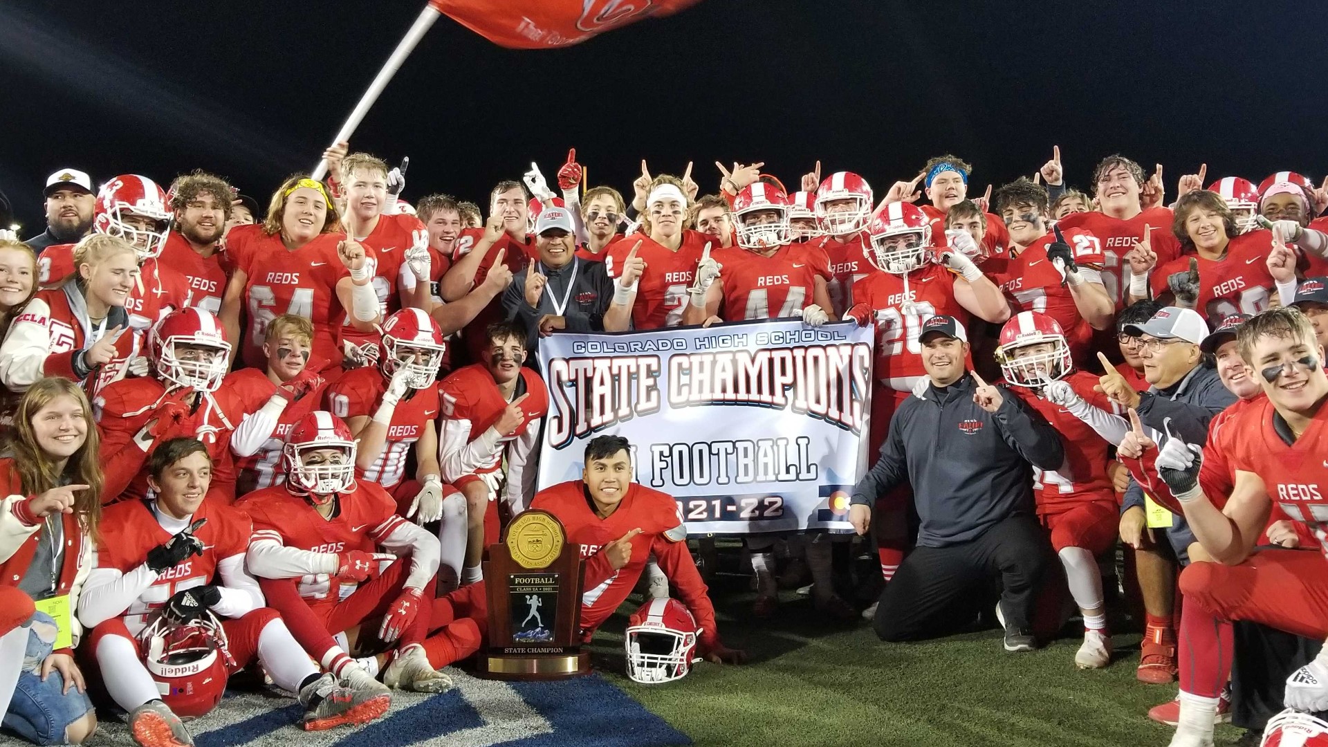 The Reds capped off their undefeated season with a win over Brush in the Class 2A state championship game.