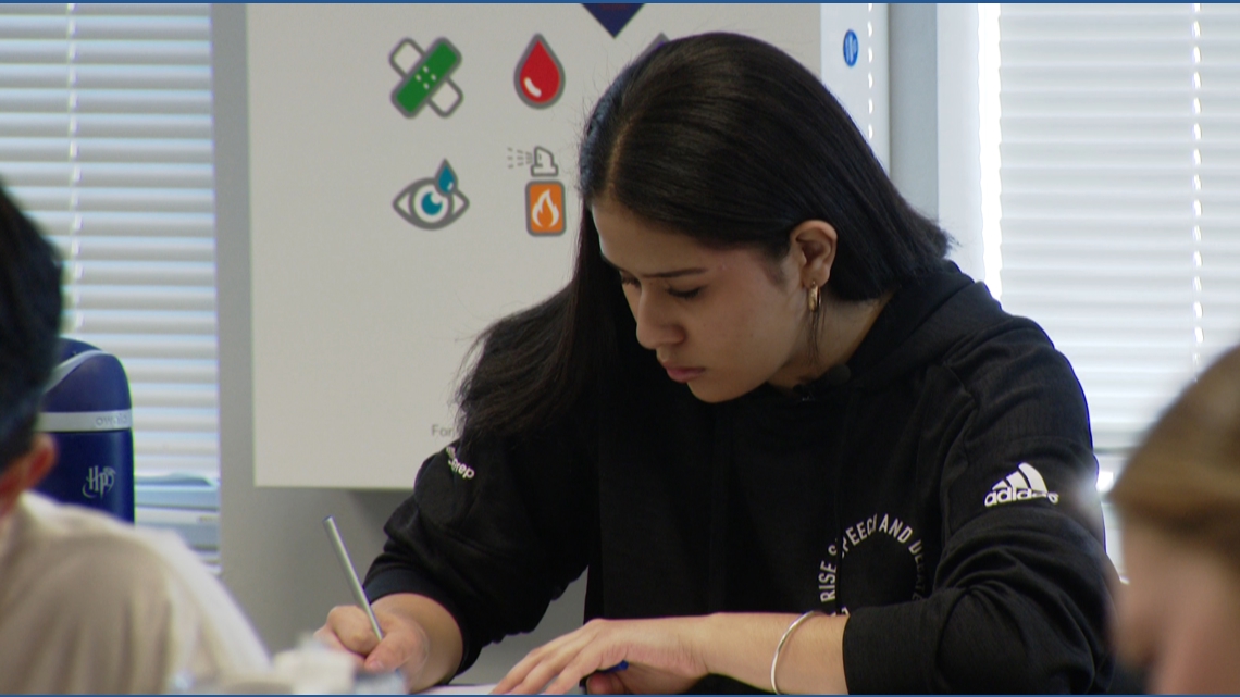 Aurora high school seniors earn college credits through dual-enrollment program