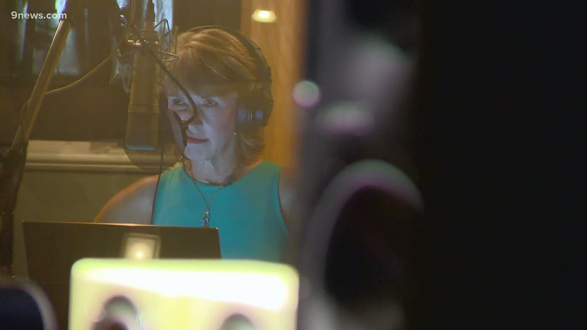 Watch as the typically calm, collected, and mellow 9NEWS anchor Kim Christiansen, freaks out a little during recording her voice for the DIA train. In February 2018, more than 75,000 people voted online to see who would be the new voices of the train—and Kim and Alan Roach were the winners. She spent a few hours at Denver's Side 3 recording studio laying down more than 40 phrases. She said she is honored—even though she was very nervous.