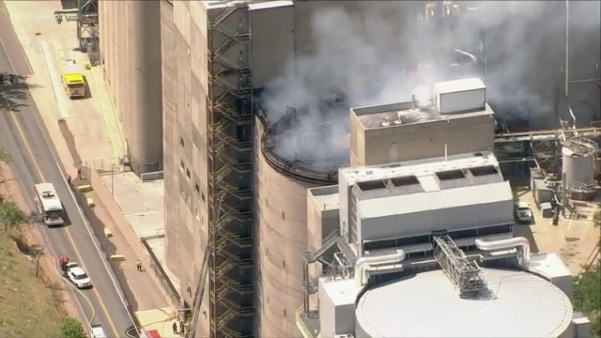 Fire crews worked to extinguish a silo fire on the Molson Coors Brewery property in Golden, Colorado, just west of Denver on Thursday, July 30, 2020.