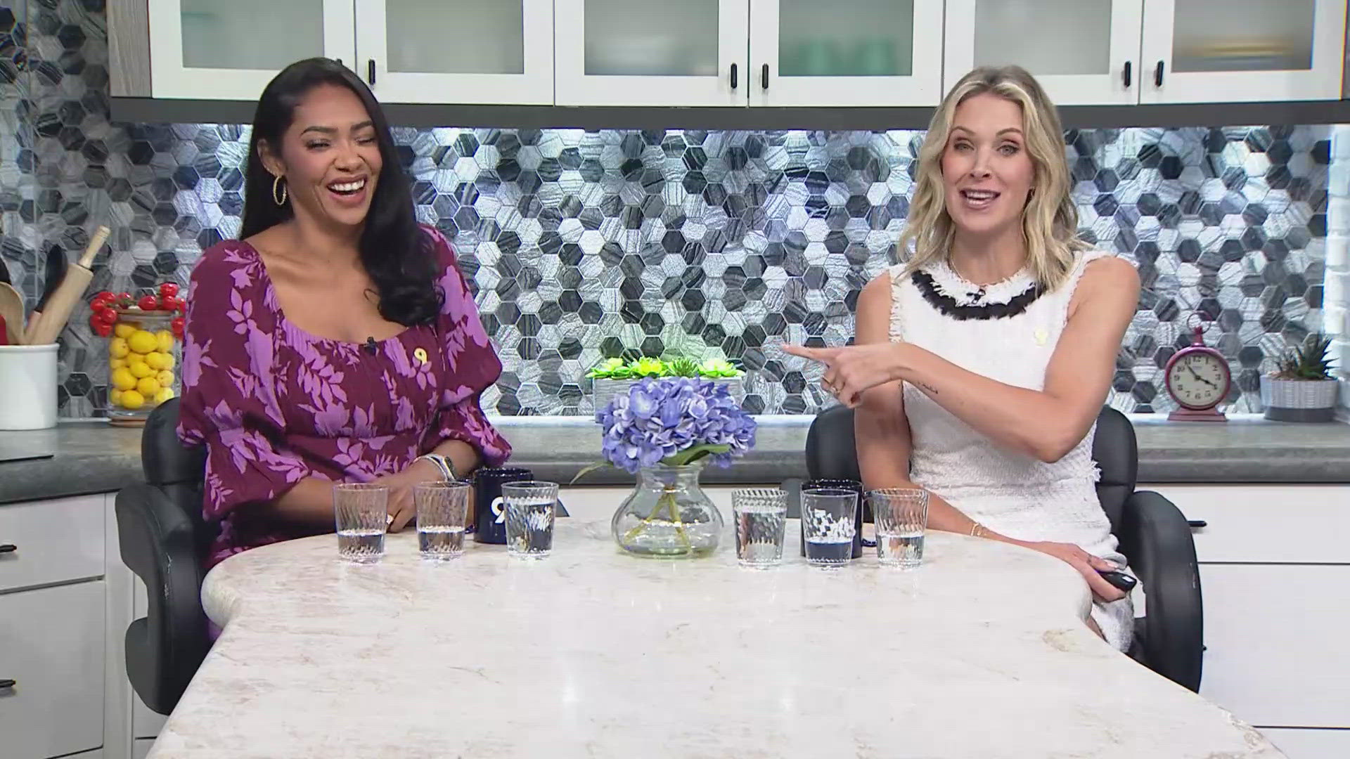 9NEWS' Alexandra Lewis and Sam Schacher taste test water to see if it's worth it to spend extra money on bottled water.