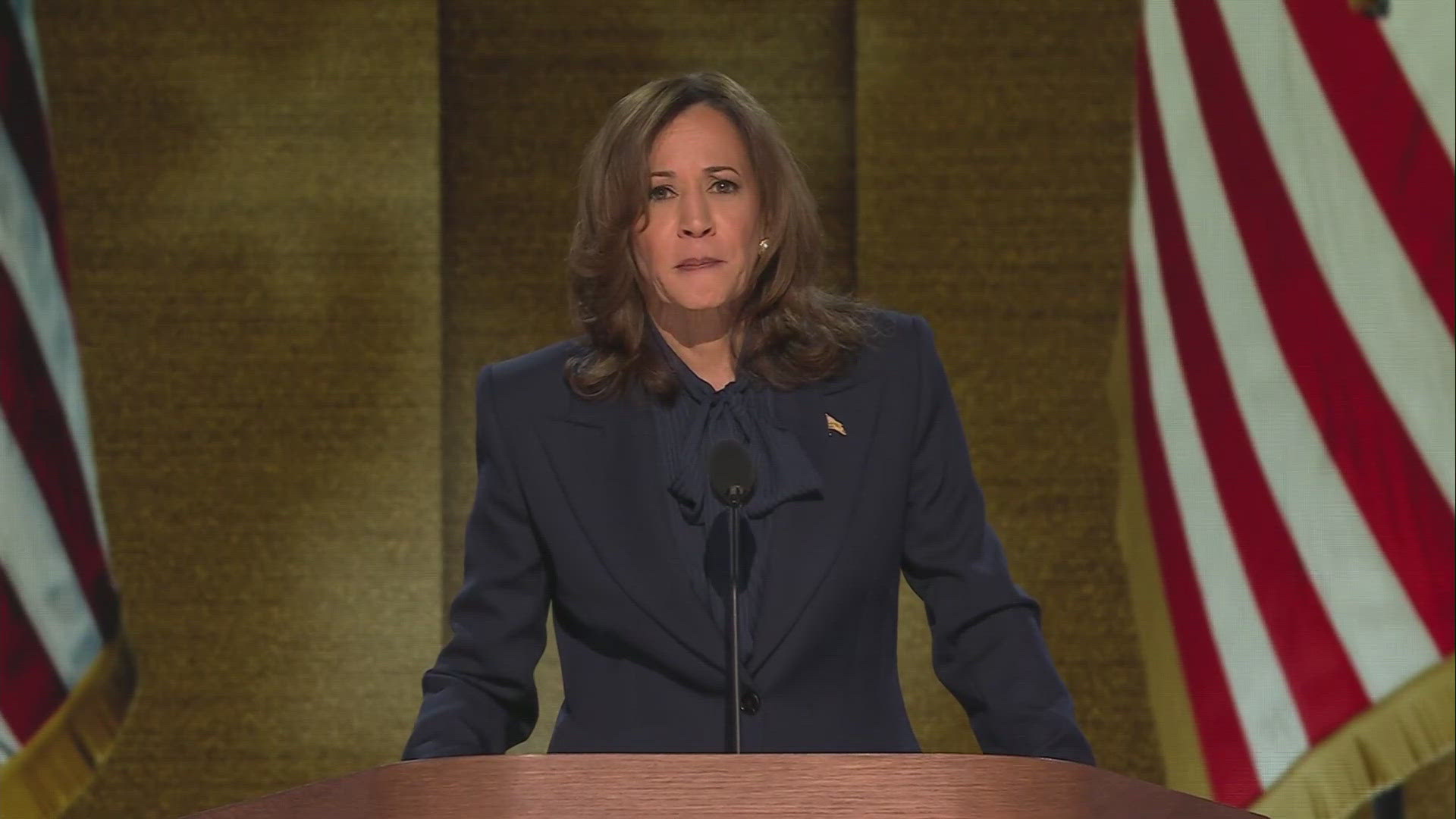 Kamala Harris becomes the first woman of color to top the ticket for any major political party and gave an unapologetic defense of America and its greatness Thursday