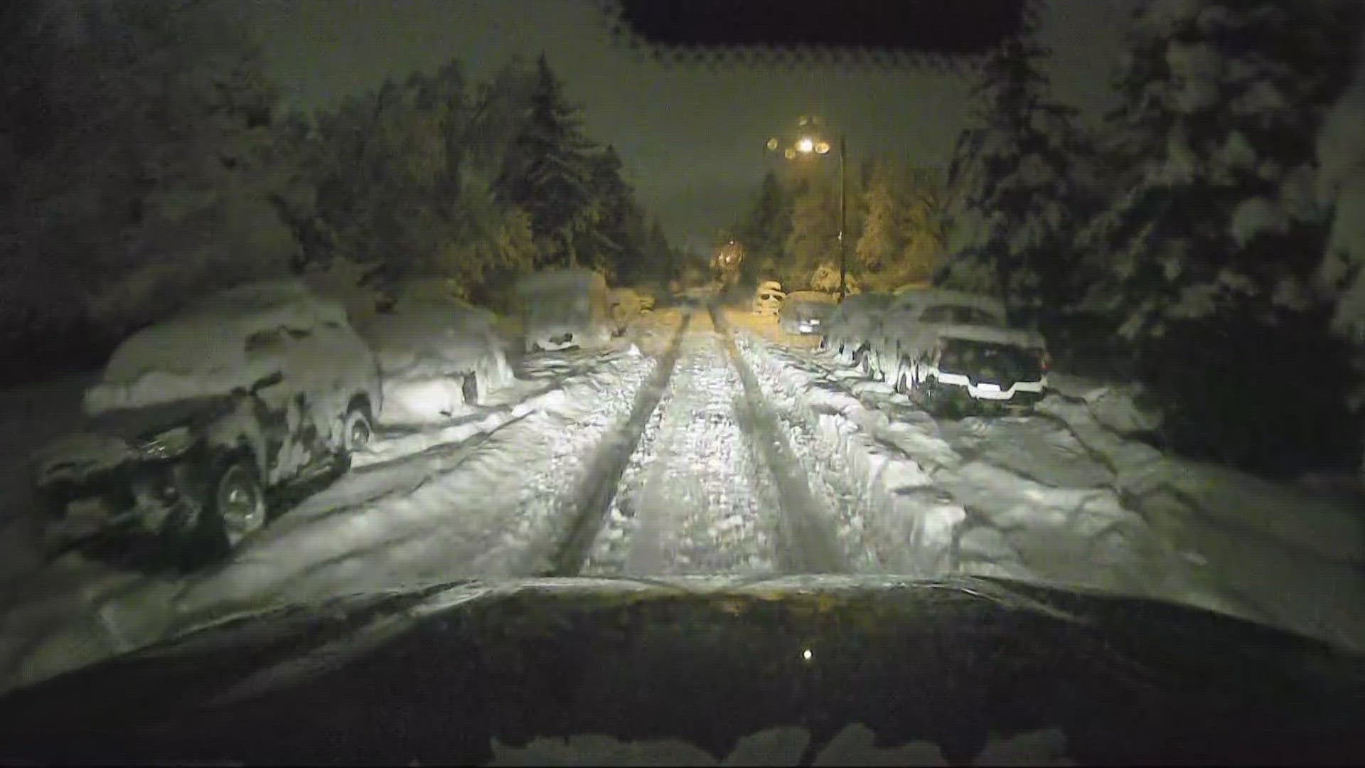 Keely Chalmers has a look at snow-packed side streets in Boulder as resident dig out from a strong March storm.