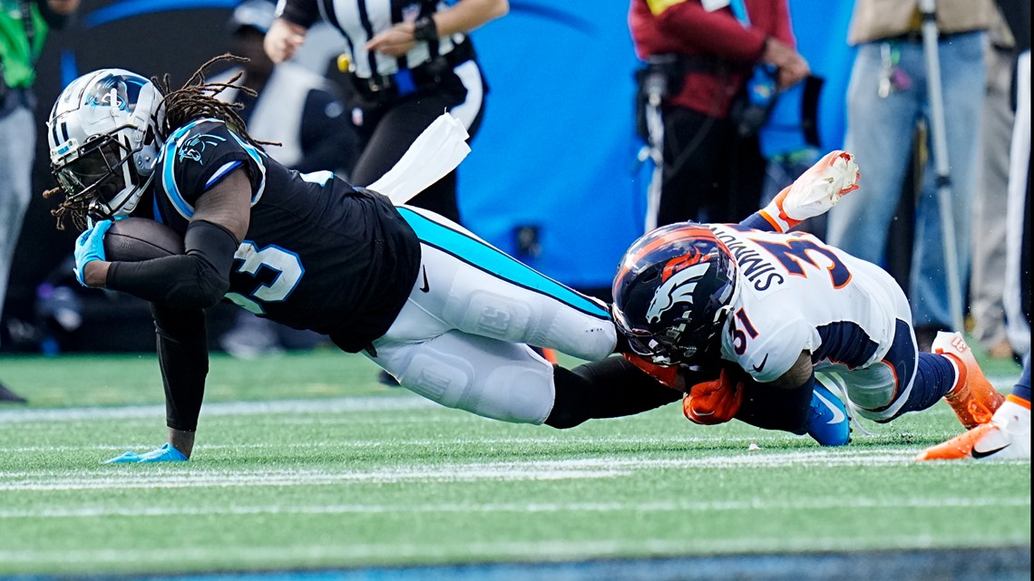 Broncos QB Russell Wilson confronted by heated DL Mike Purcell during loss  to Panthers, reaching new season low