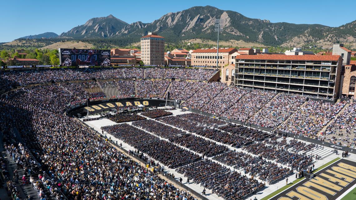CU Boulder confers record number of degrees with Kristin Davis, Shedeur Sanders in attendance
