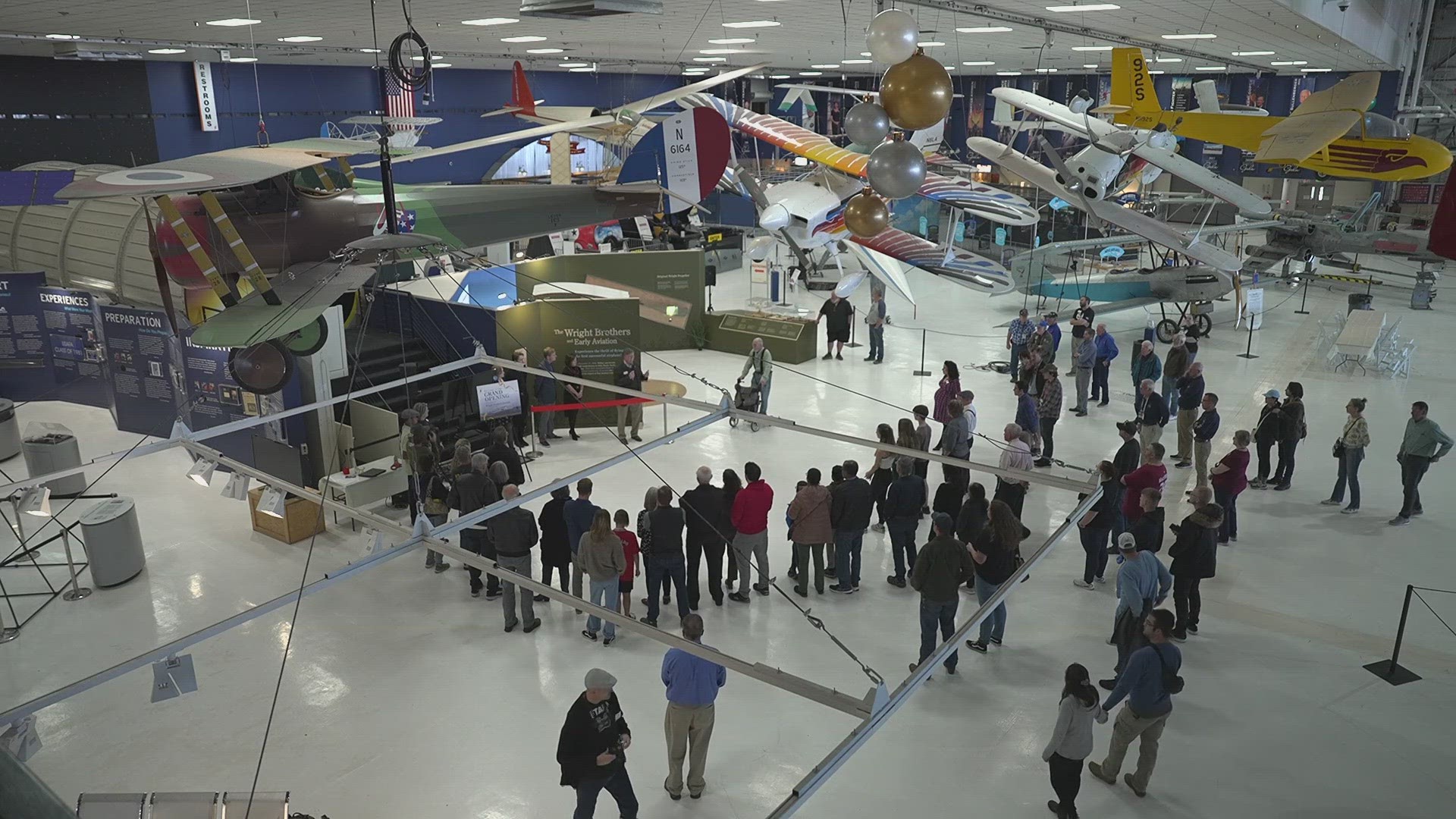 The exhibit has interactive experiences for visitors, like a Wright Flyer simulator, and an original Wright Model K propeller.
