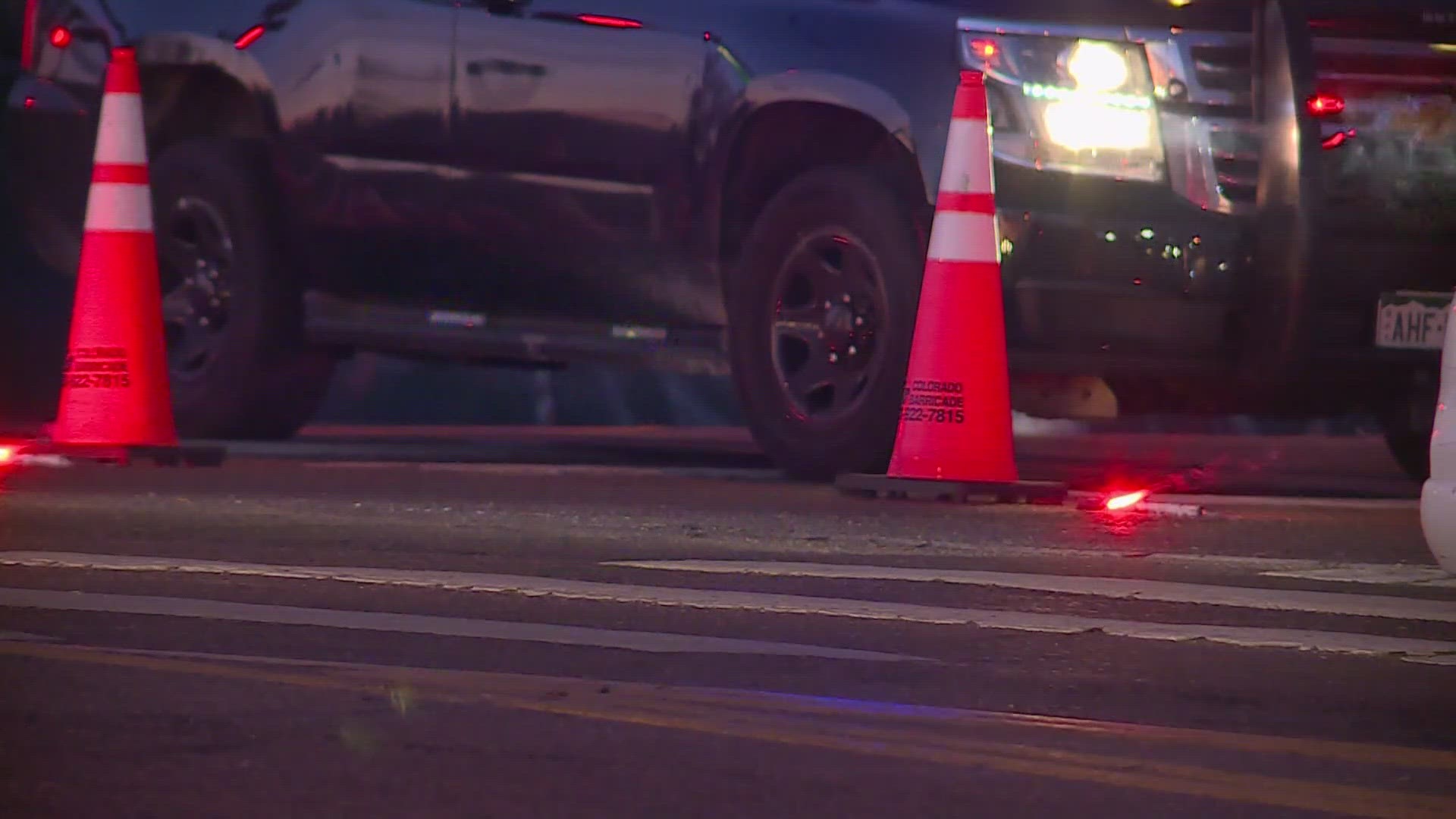 The woman was hit by gunfire after shots were fired between two vehicles near the intersection of Sable Boulevard and Smith Road in Aurora.