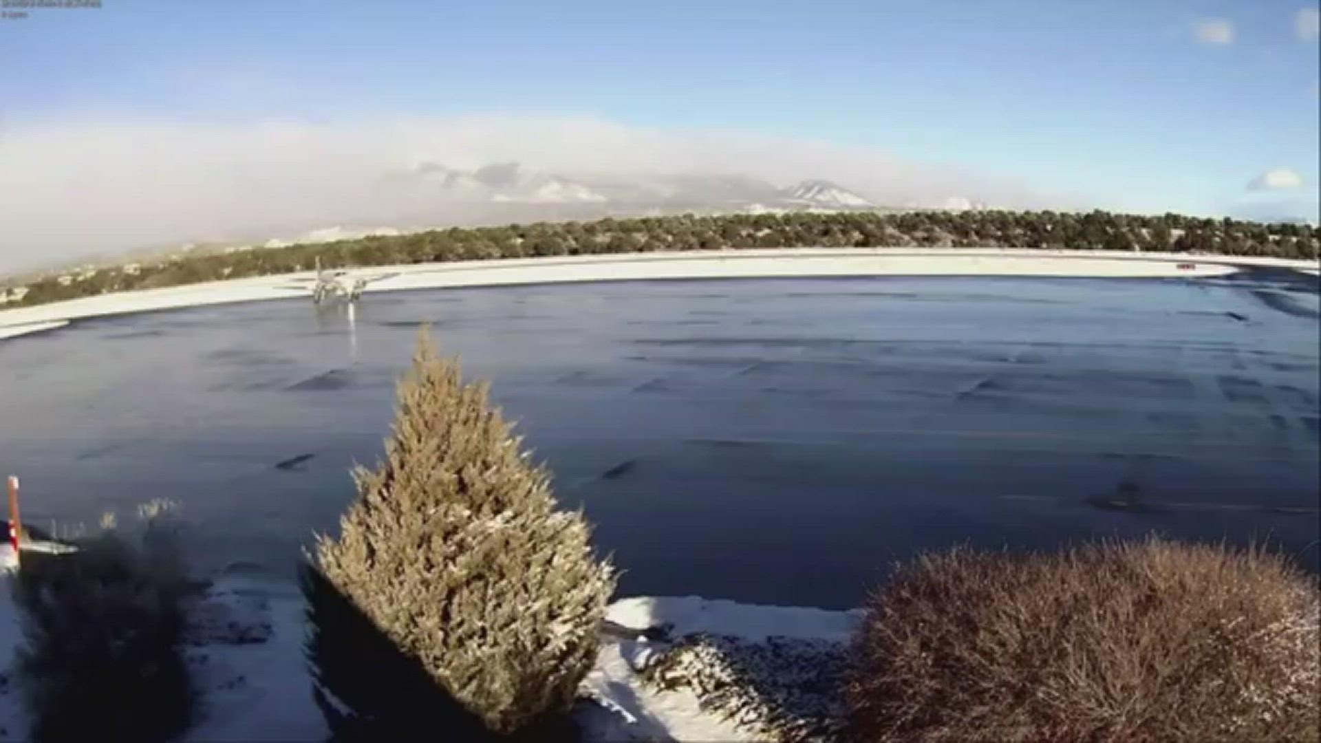 A morning freeze left the aircraft apron at a small Colorado airport covered in black ice. An airplane was seen on video sliding on the ice.