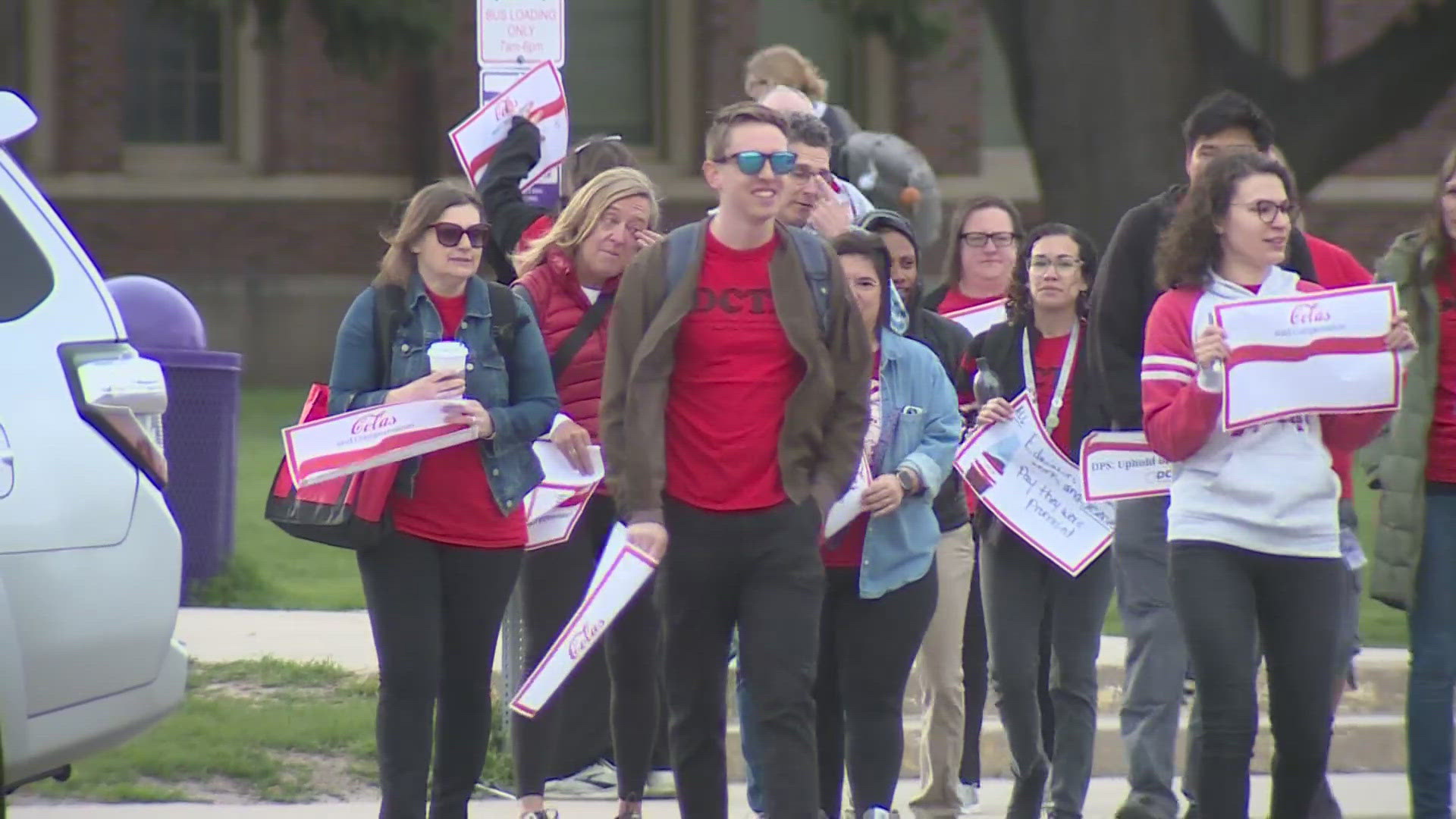 The Denver Classroom Teachers Association "walked in" to schools around the district while chanting for proper pay from Denver Public Schools.