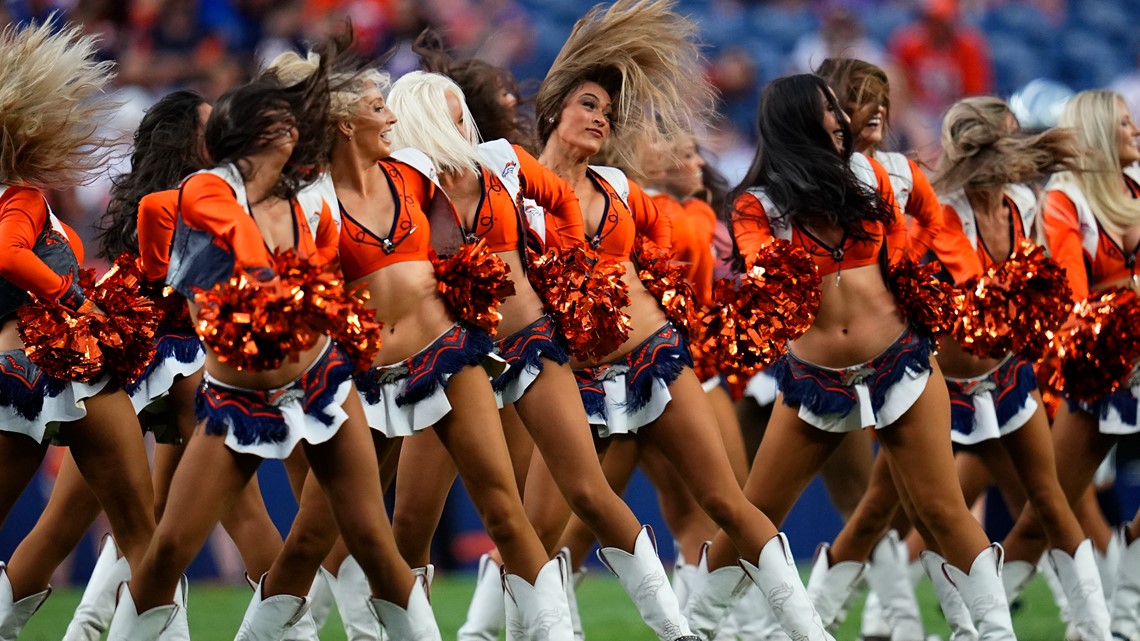 The Denver Broncos cheerleaders perform during halftime of an NFL preseason  football game against the Dallas Cowboys, Saturday, Aug. 13, 2022, in Denver.  (AP Photo/Jack Dempsey Stock Photo - Alamy