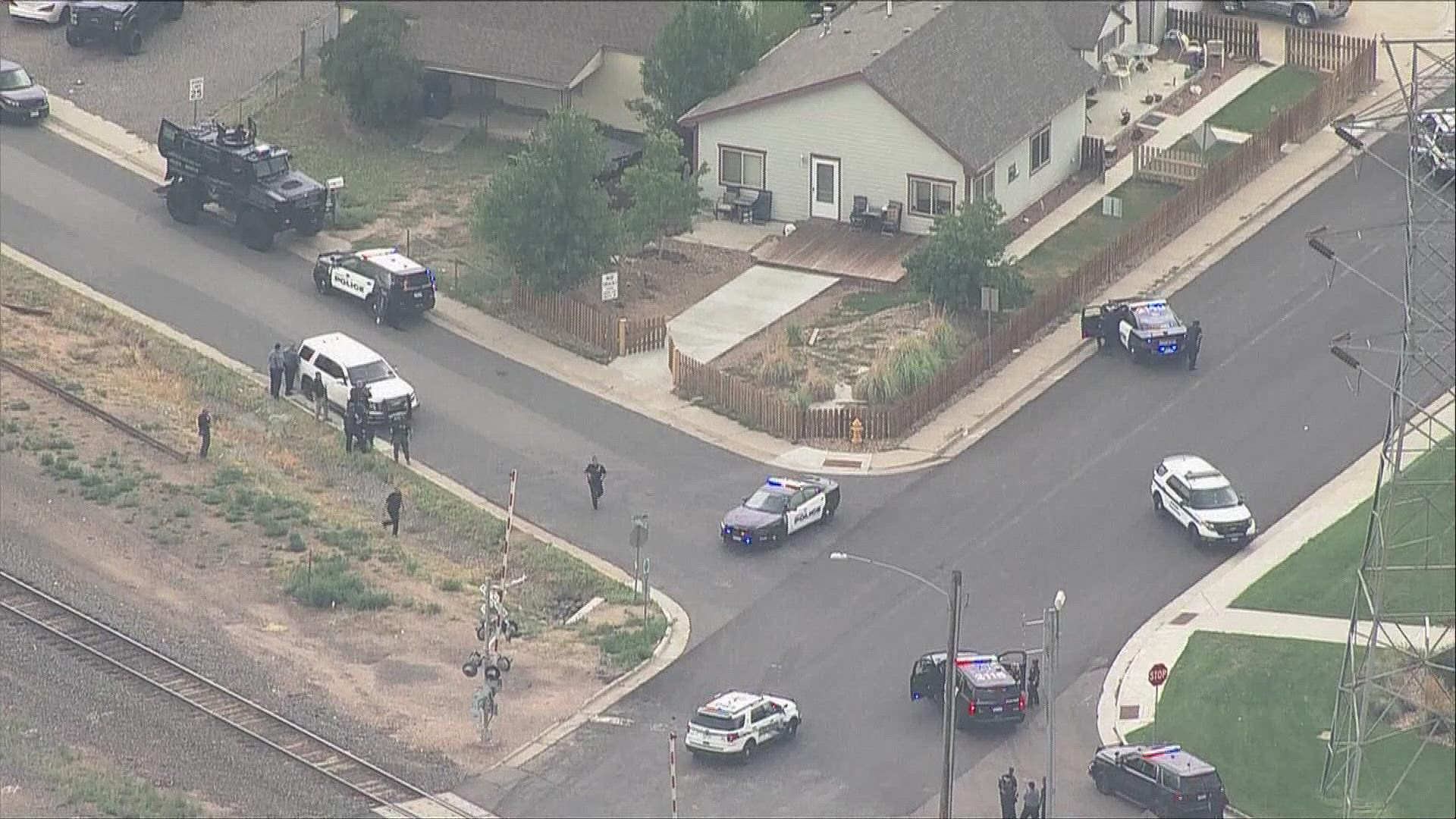 Police officers were searching a home near Fairfax Park in Commerce City, Colorado, after a shooting Tuesday night.