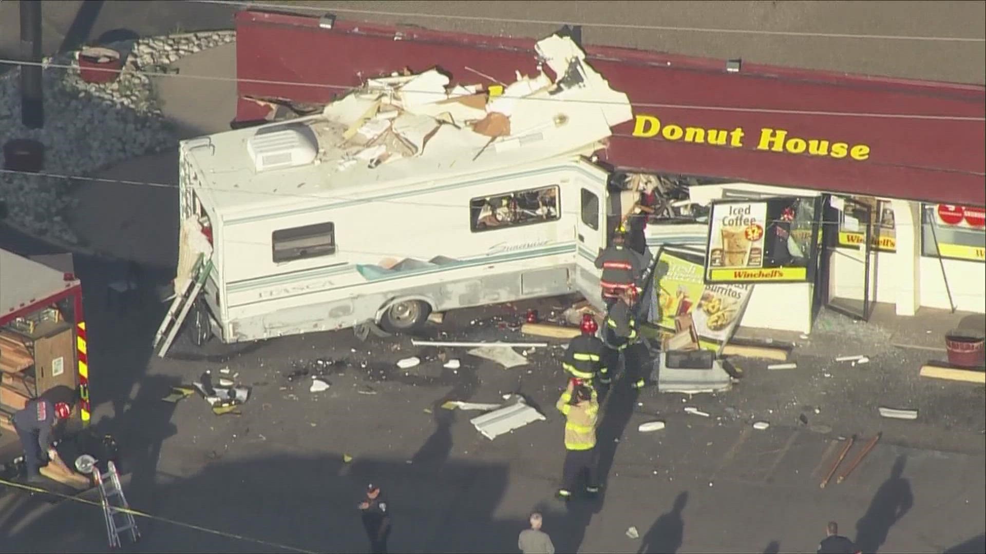 SKY9 is over the scene of an RV that crashed into the side of a Winchell’s Donut House near Colfax Avenue and Pierce Street.