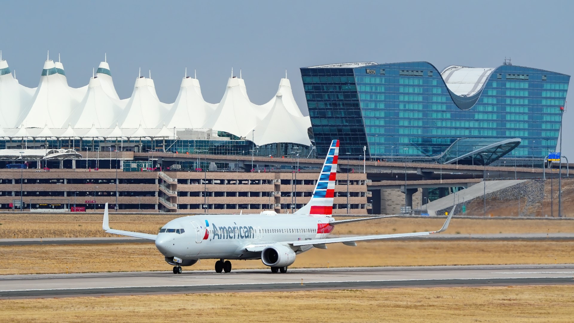 Powerful wind gusts ripped across Colorado causing hundreds of flights to be delayed or canceled at Denver International Airport.