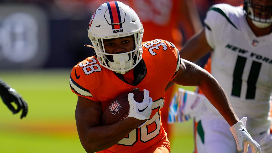 DENVER, CO - OCTOBER 23: New York Jets running back Breece Hall celebrates  his 62 yard touchdown run during a NFL game between the New York Jets and  the Denver Broncos on