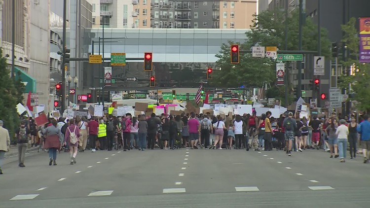 Crowd continues marching in protest of SCOTUS decision