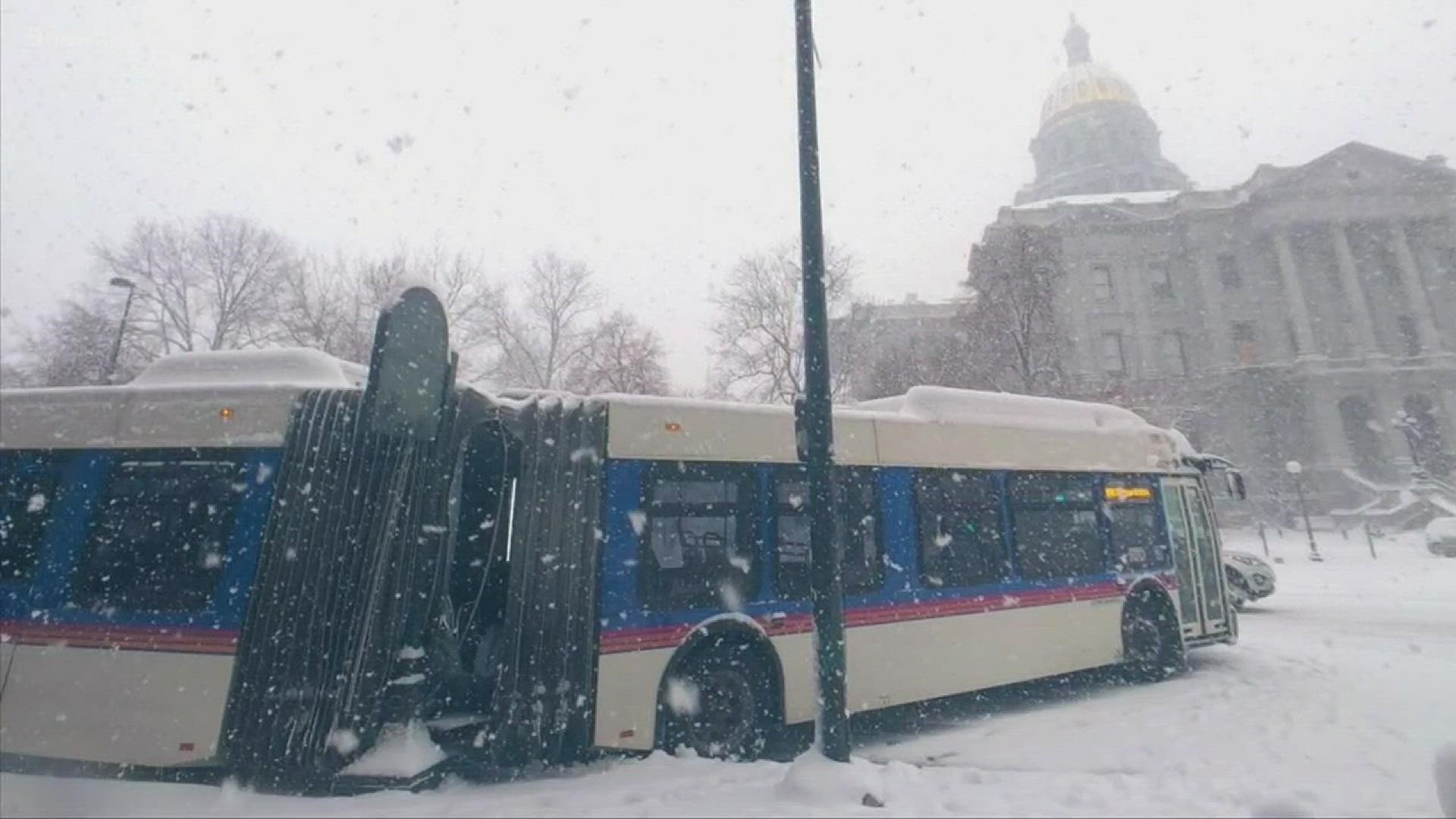 9NEWS received photos of a handful of buses that jackknifed or got stuck in the Capitol Hill area on Monday morning. One of the buses crashed on Broadway in front of the Capitol.