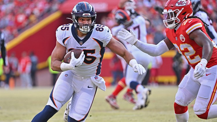 Albert Okwuegbunam of the Denver Broncos runs for yardage during the