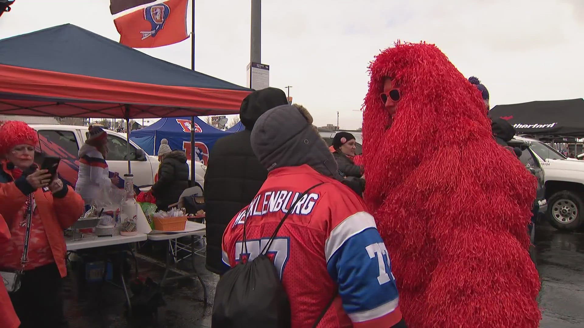 A group of fans used the tailgate ahead of the game as a memorial for Broncos superfan Kerry Green, one of the two "Mile High Monsters," who died earlier this month.