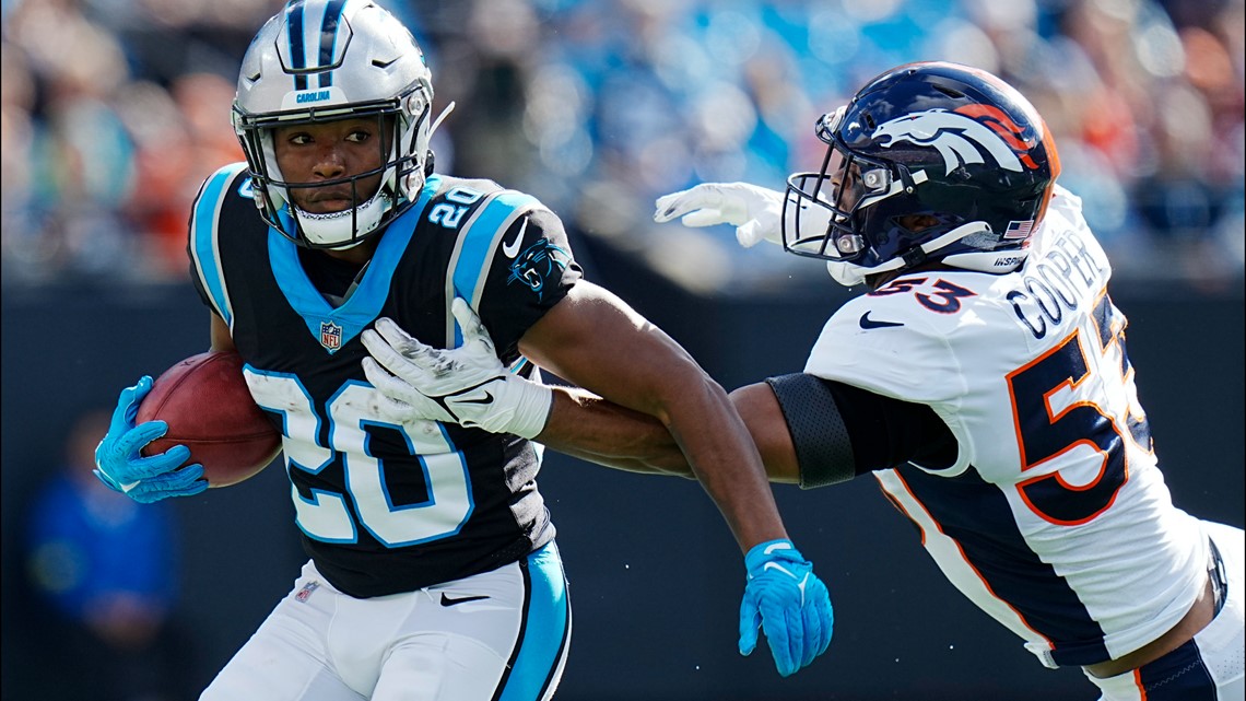 Carolina Panthers quarterback Sam Darnold (14) throws during an NFL  football game between the Carolina Panthers and the Denver Broncos on  Sunday, Nov. 27, 2022, in Charlotte, N.C. (AP Photo/Jacob Kupferman Stock