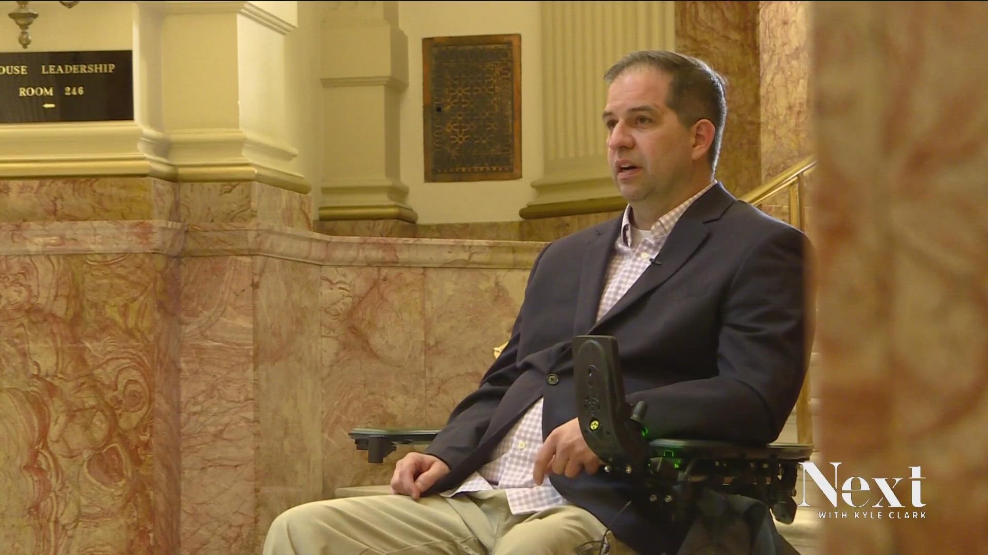 Denver City councilmember for District 10 Chris Hinds, who uses a wheelchair, said debate organizers made him get out of his wheelchair and crawl onto the stage.