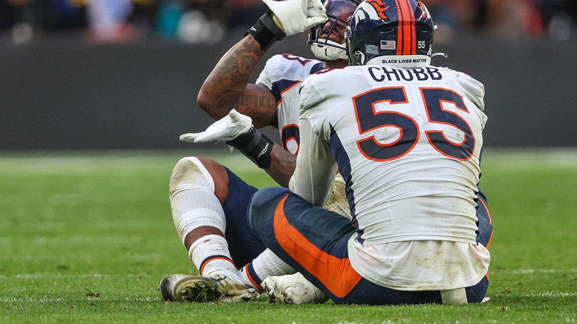 Denver Broncos orange-blue stripe uniform combo returns vs Titans