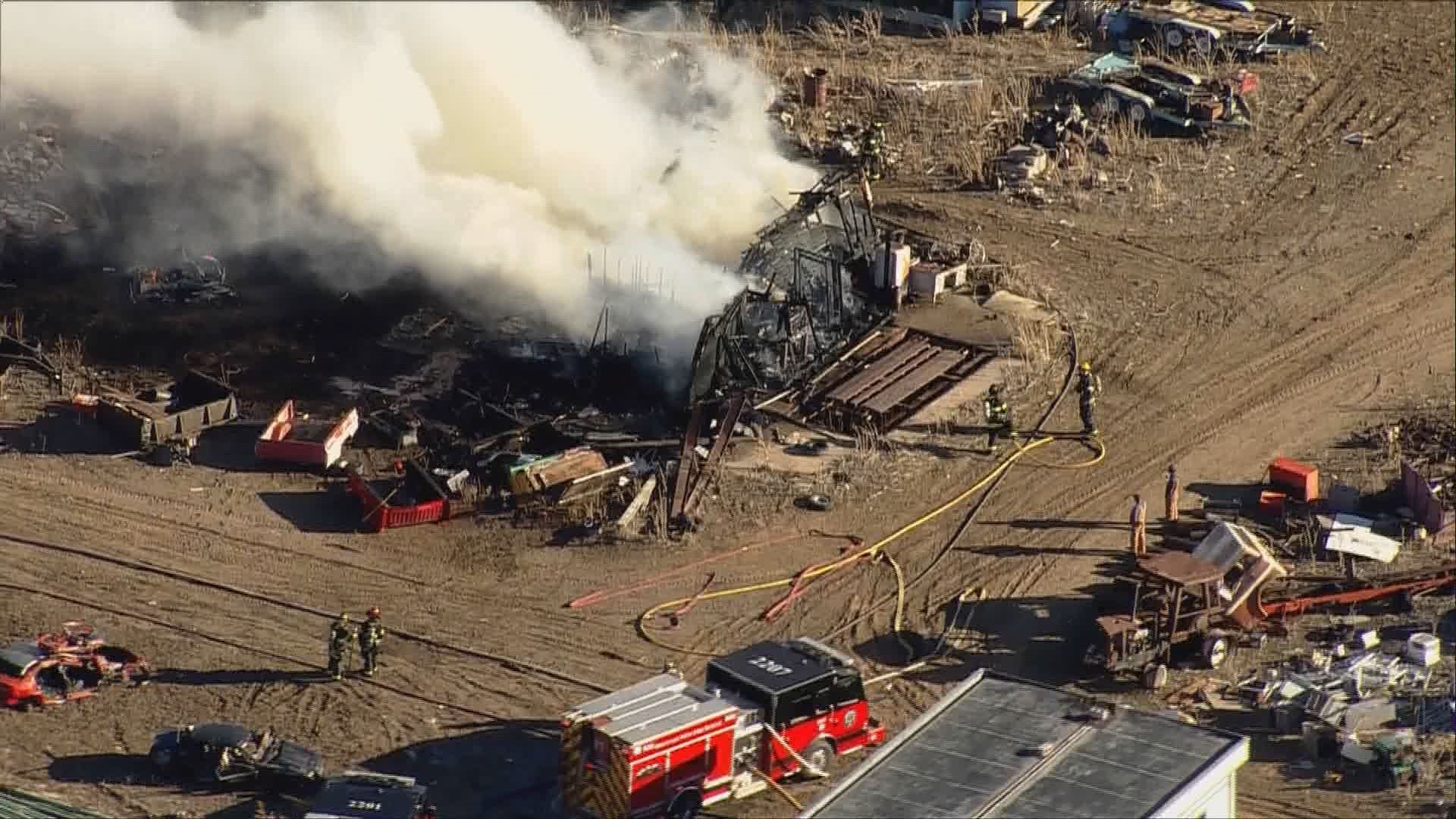 Fire at Erie salvage yard puts off large smoke plume | 9news.com