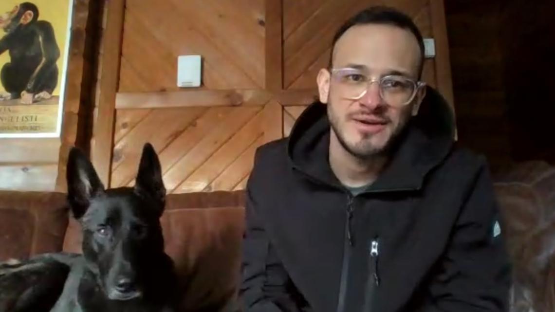 Colorado backcountry snowboarder navigates low snowpack with his dog