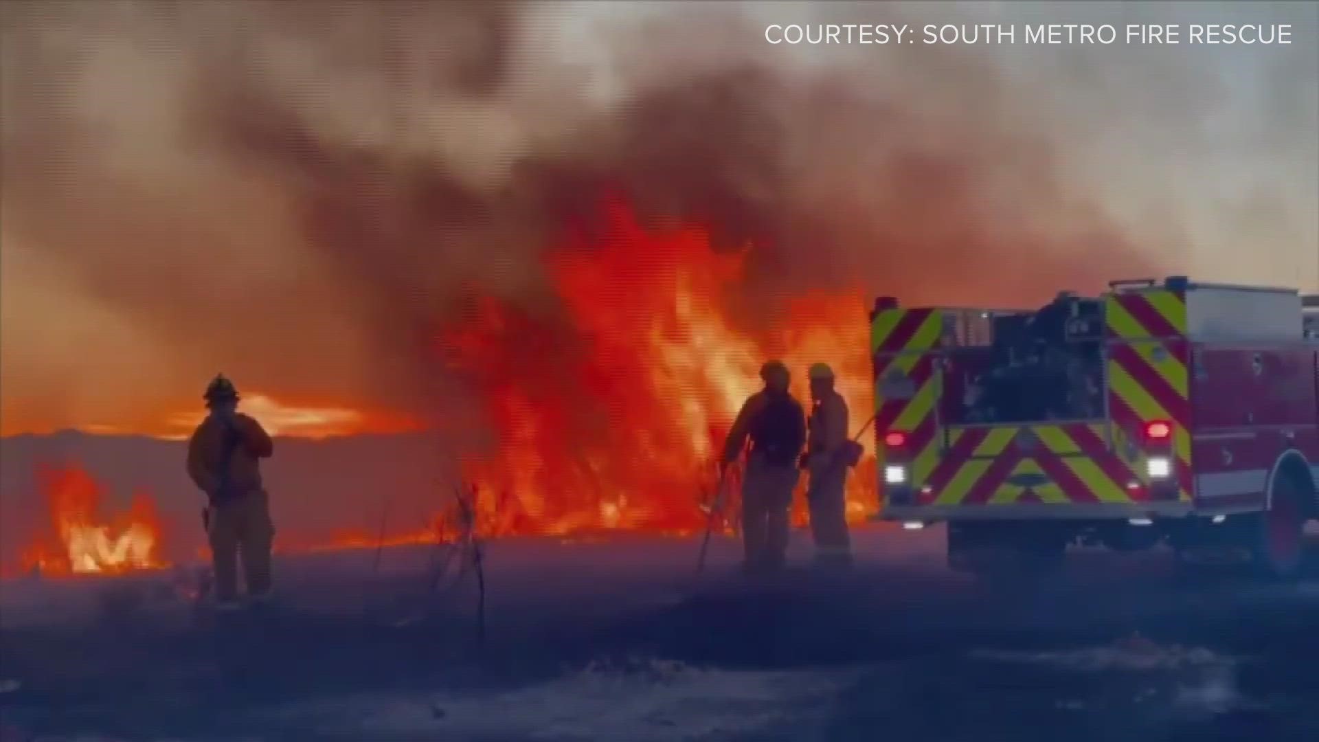 This is archival footage of wildfires being fought by South Metro Fire.