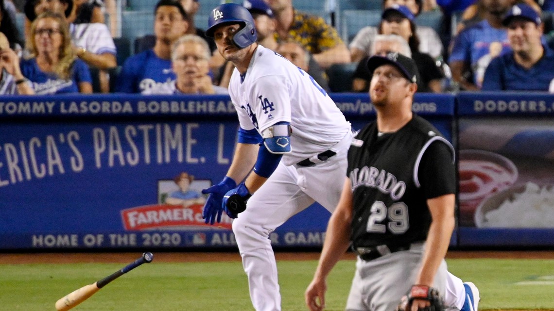 Los Angeles Dodgers' Dustin May takes liner off head during game