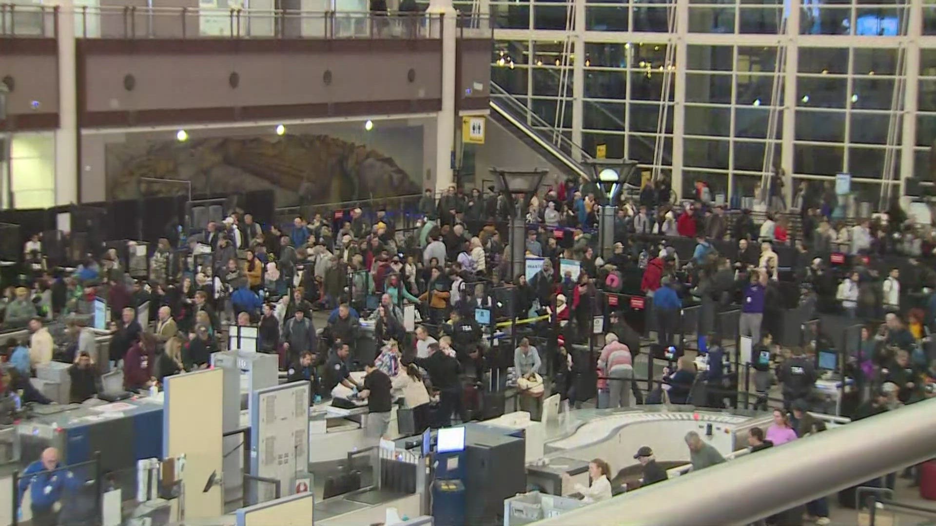 About 80,000 travelers were expected to go through Denver International Airport on Tuesday.