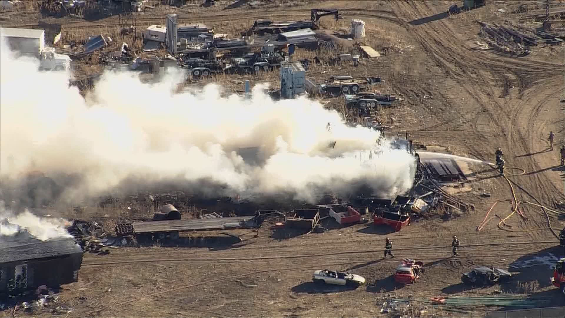 Fire at Erie salvage yard puts off large smoke plume