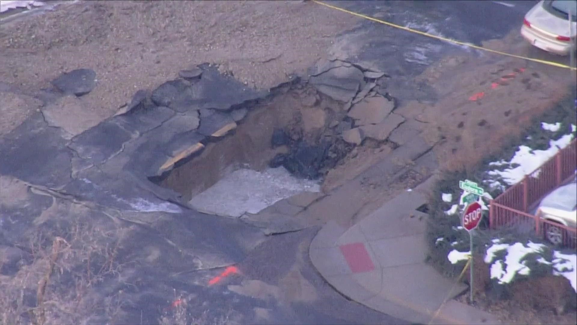 A large water main break at Eudora and 9th streets in Denver overnight led to a sinkhole opening up in the road.