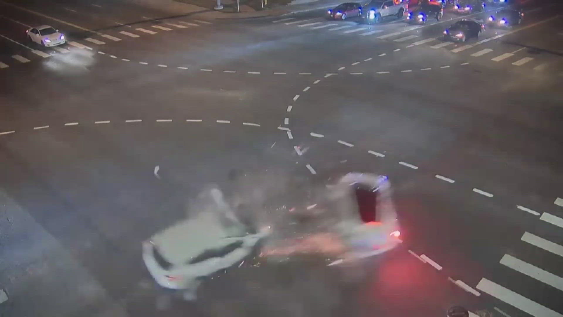 The Arapahoe County Coroner identified the man who was driving the Tesla that slammed into cars and burst into flames in Aurora on Monday. 