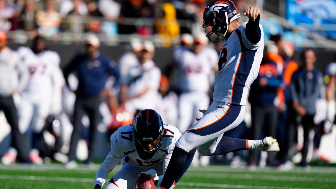 Broncos QB Russell Wilson confronted by heated DL Mike Purcell during loss  to Panthers, reaching new season low