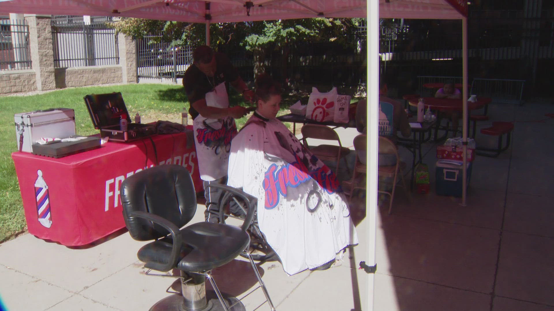 A partnership between the Colorado Coalition for the Homeless and a local barber provides free haircuts as part of their outreach services.