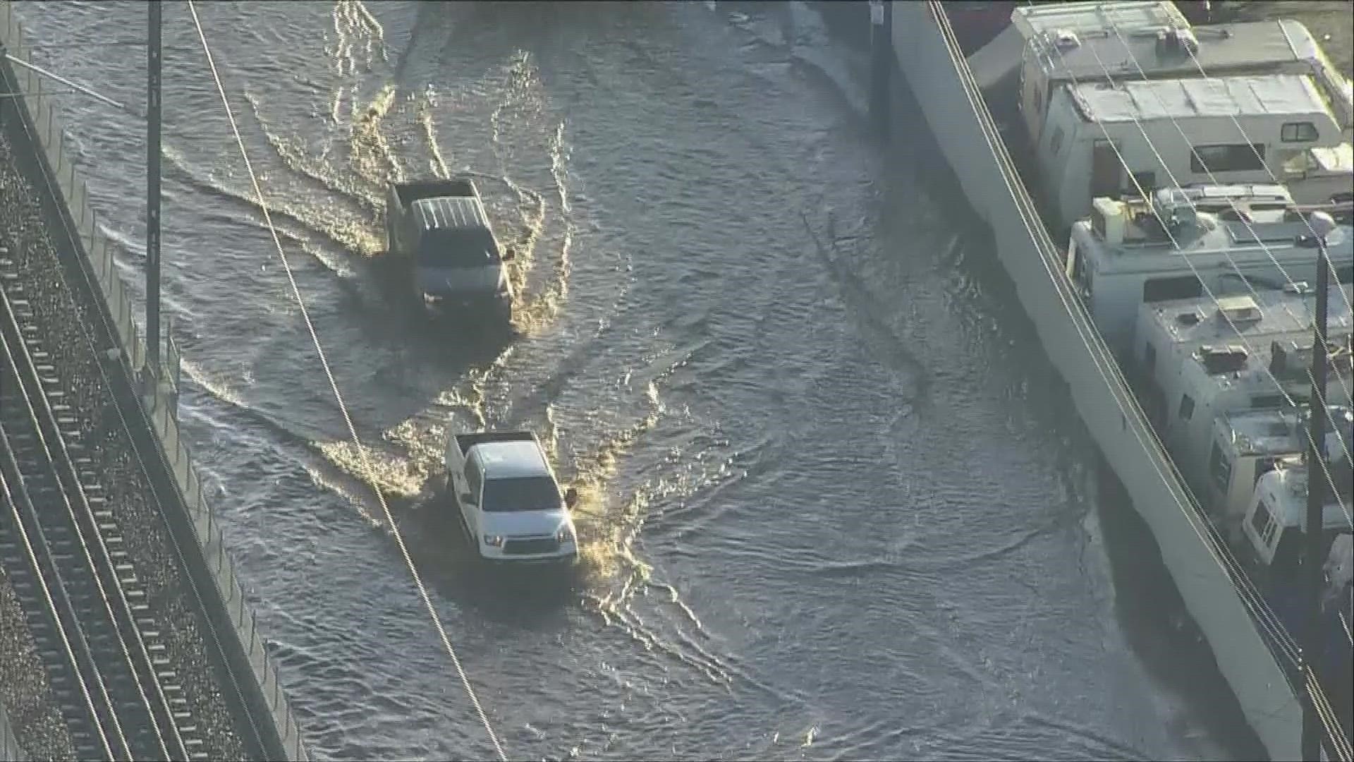 SKY9 was over Brighton Boulevard and York Street on Monday morning where cars could be seen driving through flooded streets after yesterdays heavy rain.