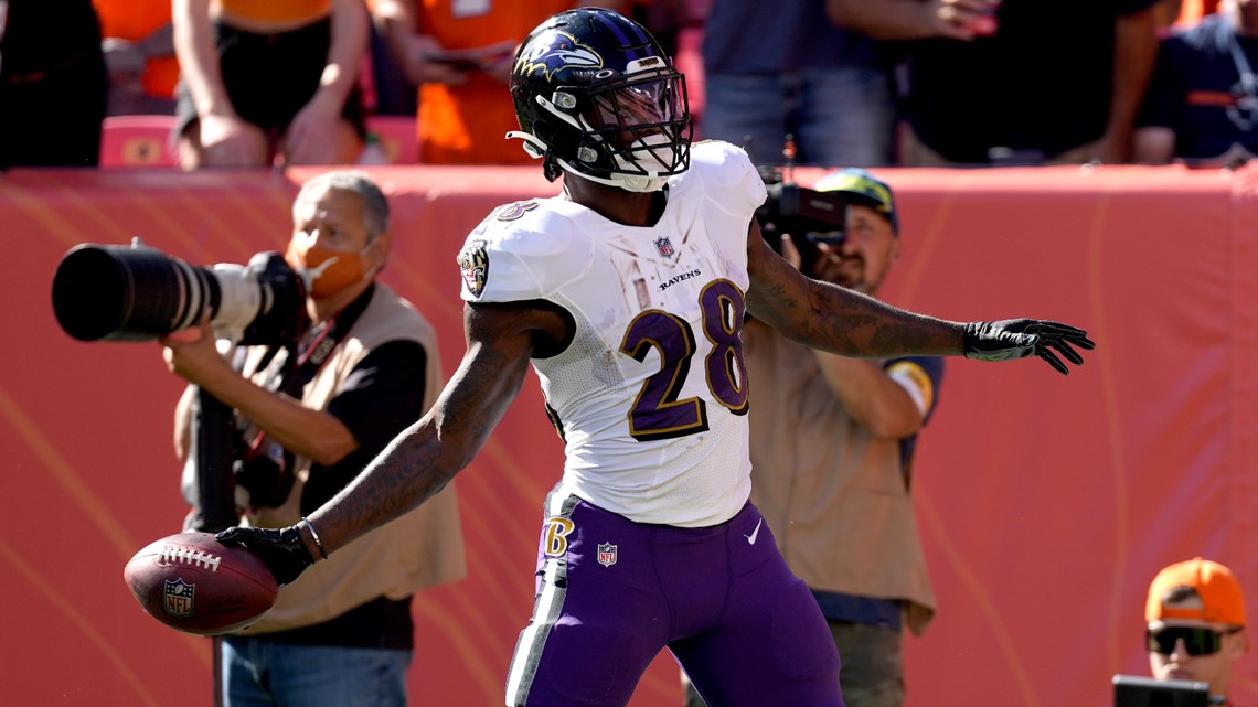 Denver Broncos running back Latavius Murray (28) walks on the sidelines  before the second half of an NFL football game against the Tennessee Titans  Sunday, Nov. 13, 2022, in Nashville, Tenn. (AP