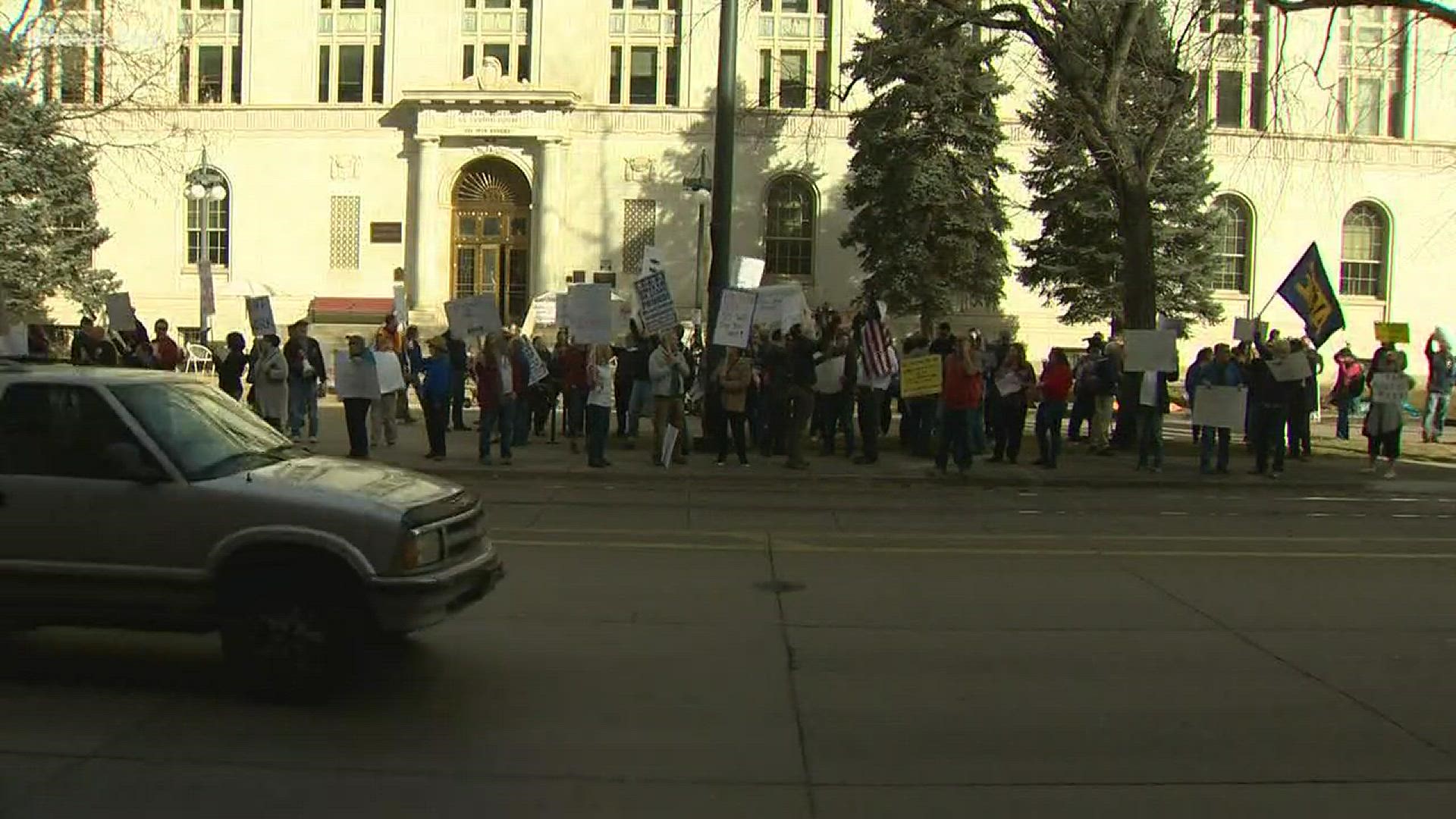 Federal workers took to the streets in downtown Denver Thursday afternoon to protest the government shutdown.