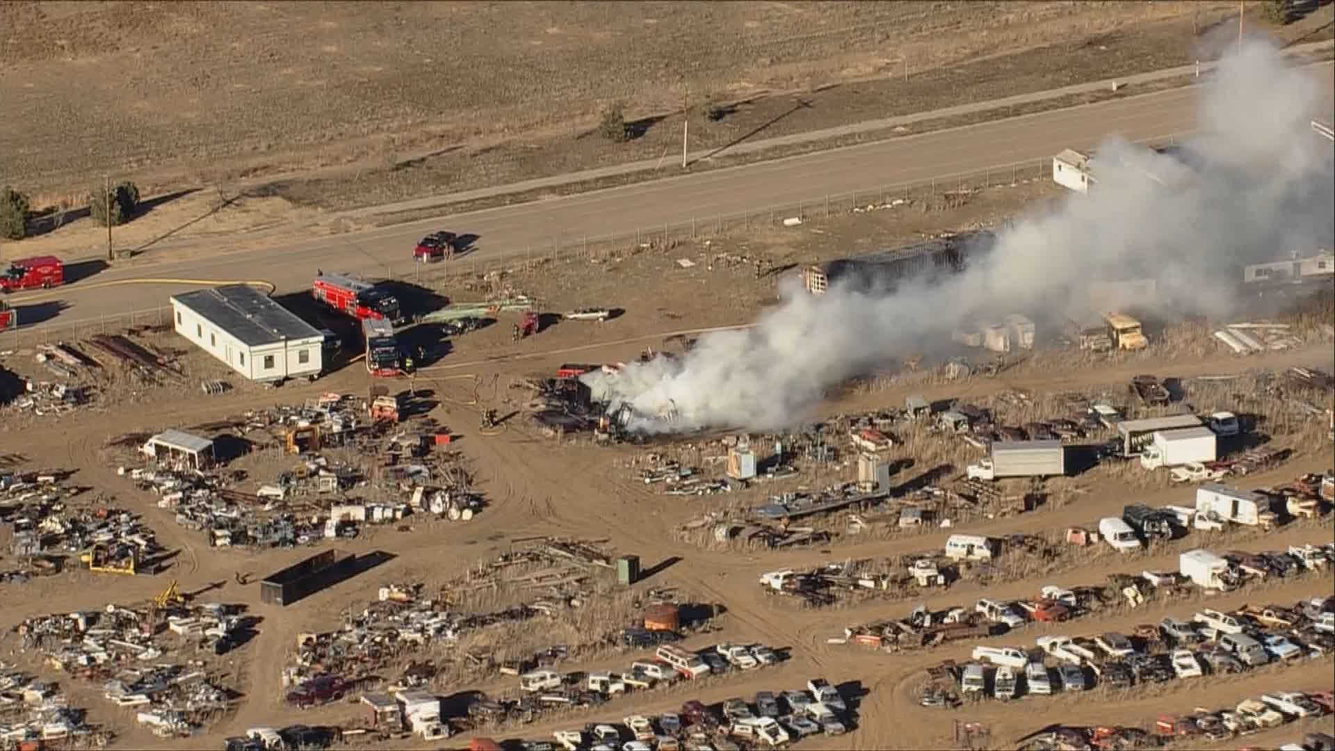 Fire at Erie salvage yard puts off large smoke plume | 9news.com