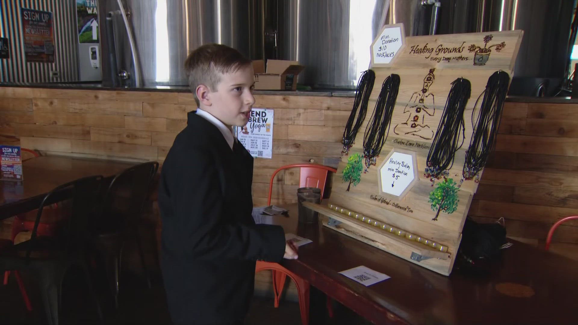 Simon Emge, 9, handmade 300 necklaces to sell and raise money for his teachers who lost school supplies at Northridge Elementary.