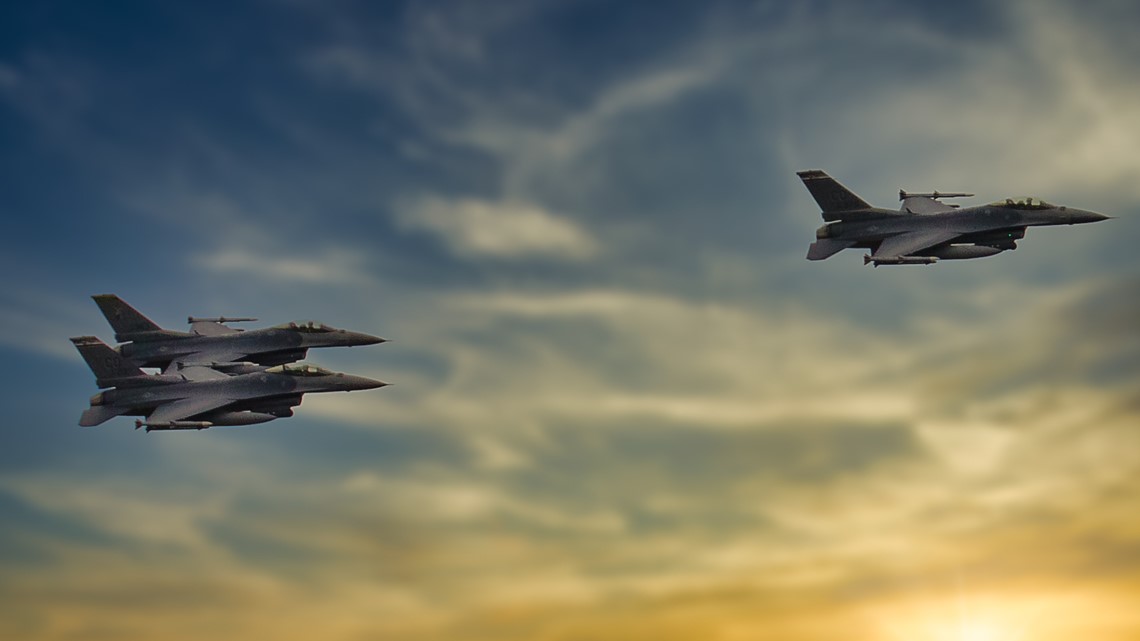 DENVER, CO - DECEMBER 11: A pair of F-16 military jets performs a flyover  before a game between the Kansas City Chiefs and the Denver Broncos at  Empower Field at Mile High