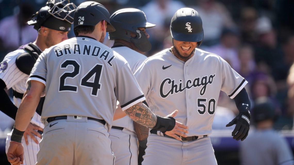 The Chicago White Sox baseball team congratulates each other with